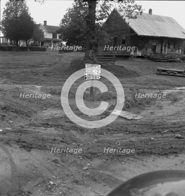 Crossroads hamlet after a rain, Culbreth, Granville County, North Carolina, 1939. Creator: Dorothea Lange.