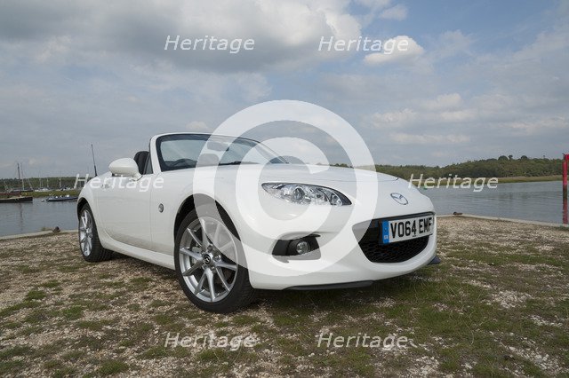 2014 Mazda MX5 Roadster Coupe Artist: Unknown.