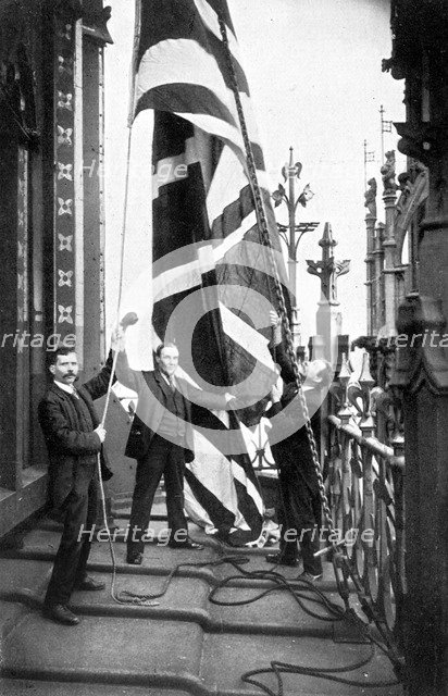 Hoisting the Union Jack, Houses of Parliament, Westminster, c1905. Artist: Unknown