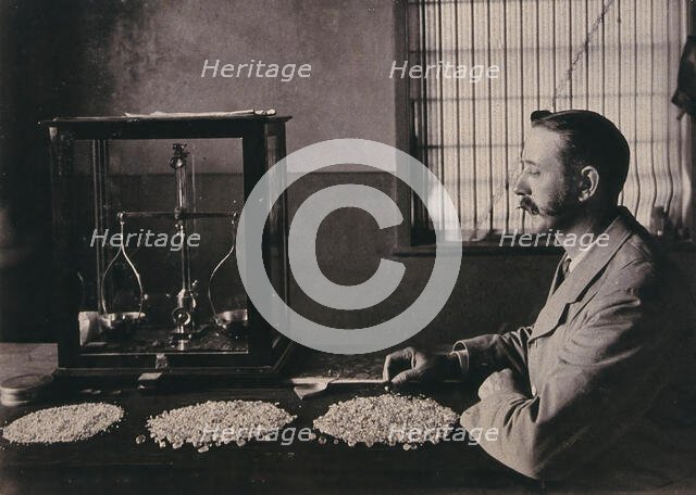 South Africa: an employee of De Beers counting the diamonds mined that day, 1896. Creator: Unknown.