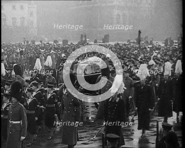 Crowd Watching the Funeral Procession of George V, His Majesty The King, 1936. Creator: British Pathe Ltd.