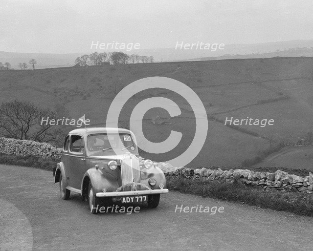 Vauxhall 10 of Miss IM Burton competing in the RAC Rally, 1939 Artist: Bill Brunell.