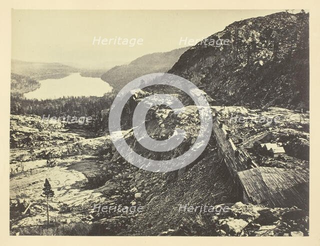 Summit of Sierra Nevada, Snow Sheds in Foreground, Donner Lake in the Distance, C. P. R. R., 1868/69 Creator: Andrew Joseph Russell.