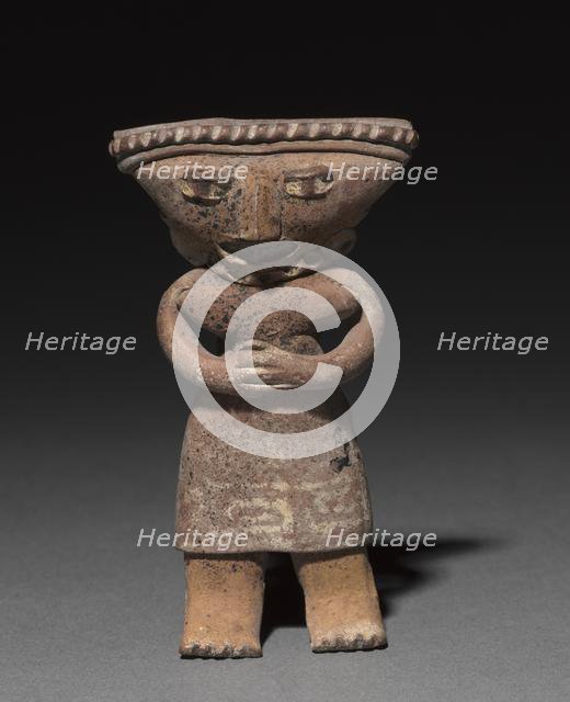 Standing figurine holding an animal (dog?), 300 B.C. to A.D. 300. Creator: Unknown.