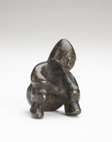 Ornament in the form of a seated person, Possibly Han dynasty, 206 BCE-220 CE. Creator: Unknown.