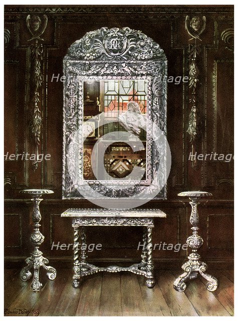 Mirror, gueridons, and table overlaid with silver plaques, 1910.Artist: Edwin Foley