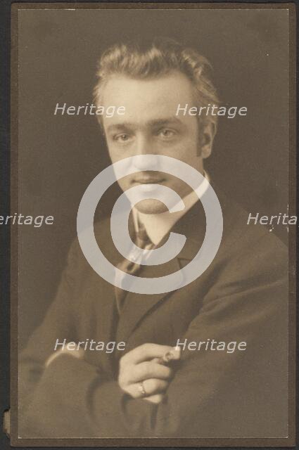 Portrait of a Man Holding Cigar, 1907-1924. Creator: Louis Fleckenstein.