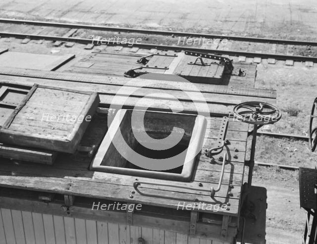 Freight car at potato shed, Tulelake, Siskiyou County, California, 1939. Creator: Dorothea Lange.