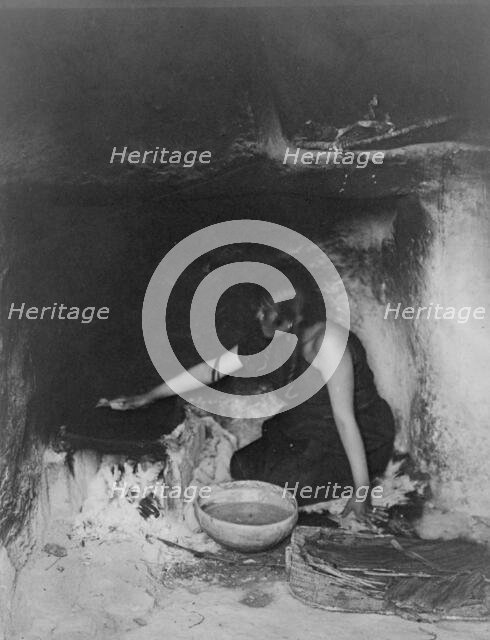 The piki maker-Hopi, c1906. Creator: Edward Sheriff Curtis.
