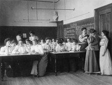 Group of young women studying static electricity in normal school, Washington, D.C., (1899?). Creator: Frances Benjamin Johnston.