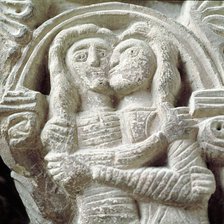 Couple of lovers, detail of a capital in the cloister of the Monastery of Santa Maria de l'Estany.