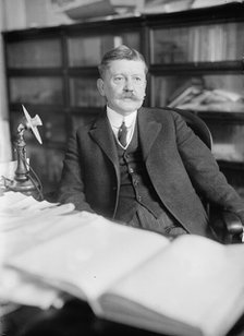 Edward B. Moore, Commissioner of Patents - At Desk, 1912. Creator: Harris & Ewing.