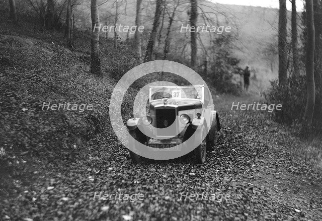 W Wright's Morris Minor with body by Arrow competing in the Inter-Varsity Trial, November 1931. Artist: Bill Brunell.
