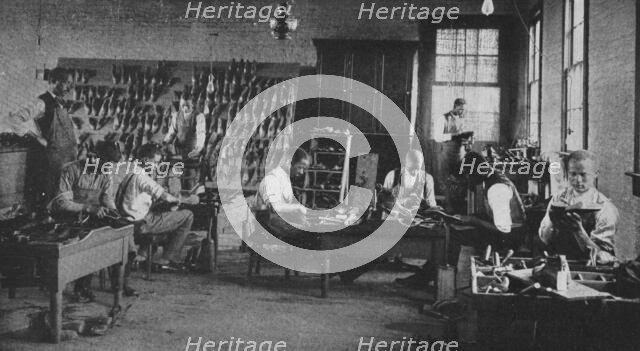 Shoe shop making and repairing, 1904. Creator: Frances Benjamin Johnston.