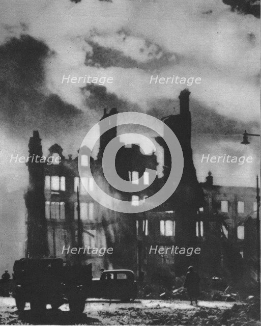 'Dawn Breaks to find the city transfigured after a night of hell', 1941 (1942). Artist: Unknown.