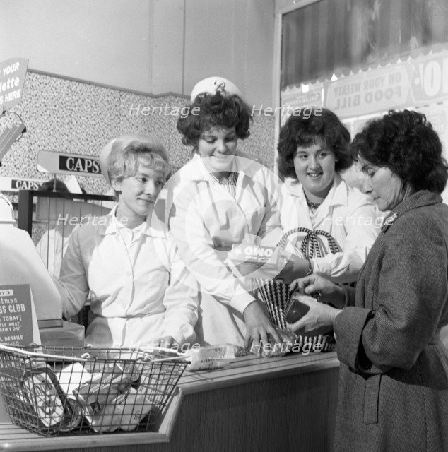 Checkout girls at a supermarket opening, Brough's Ltd, Thurnscoe, South Yorkshire, 1963. Artist: Michael Walters