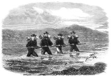 An Exploring Party on the West Coast of New Zealand: crossing the River Teramakau, 1865. Creator: Unknown.