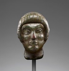 Head from a Statuette of a Youth, early 5th century BC. Creator: Unknown.