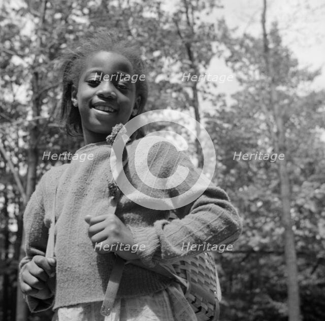 A camper all ready to start on a hike at Camp Fern Rock, Bear Mountain, New York, 1943 Creator: Gordon Parks.
