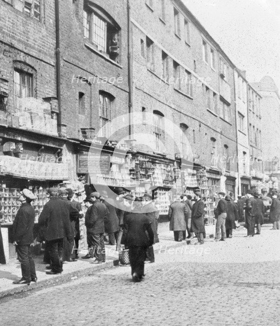 Sunday bird fair, Sclater Street, off Brick Lane, London, c1900. Artist: John Galt