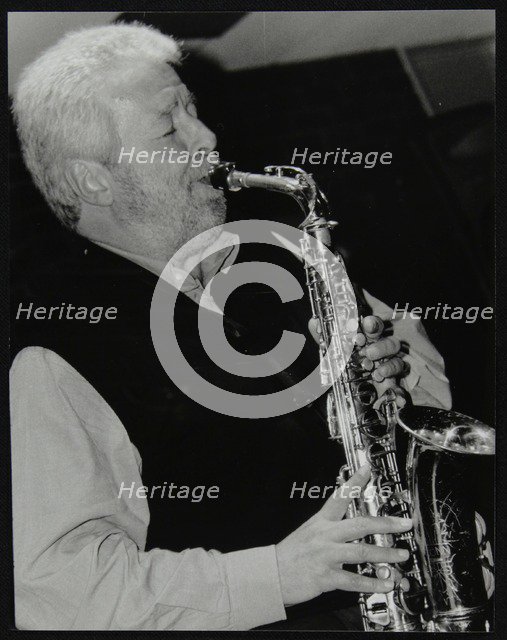 Geoff Simkins playing alto saxophone at The Fairway, Welwyn Garden City, Hertfordshire, 2002. Artist: Denis Williams