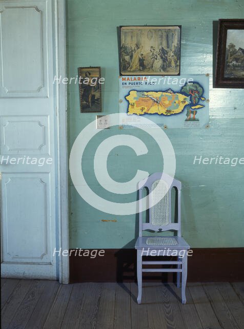 Malaria poster in small hotel, Puerto Rico ... San Juan, 1941. Creator: Jack Delano.