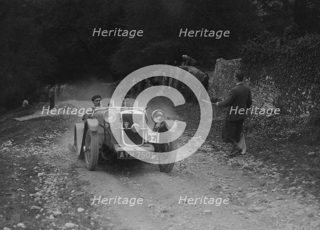 Hillman Aero Minx competing in a motoring trial, Nailsworth Ladder, Gloucestershire, 1930s.. Artist: Bill Brunell.