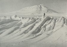'Mount Erebus Over a Water-Worn Iceberg', October 1911, (1913). Artist: Herbert Ponting.
