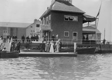 N.Y. Yacht Club Landing - Newport J.J. Astor & party, between c1910 and c1915. Creator: Bain News Service.