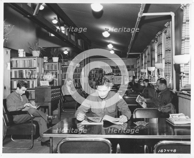 Soldiers reading in the library in Service Club No 1, Fort Sheridan, Illinois, USA, 1943. Artist: Unknown