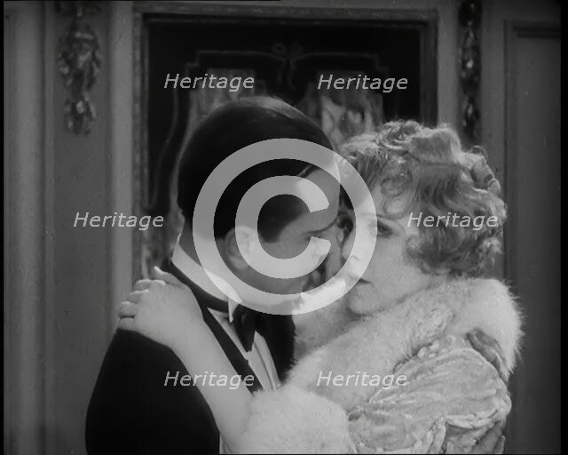 Scene from the Film 'Champagne': The Actress Betty Balfour Embracing the Male Actor Jean..., 1920s. Creator: British Pathe Ltd.