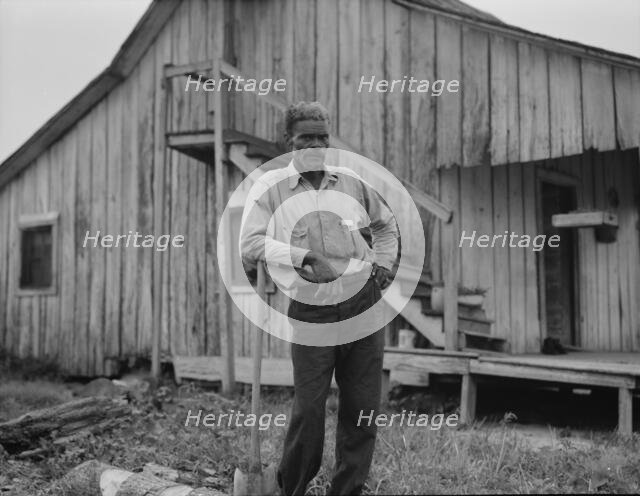Cotton worker in Sunday clothes, near Blytheville, Arkansas, 1937. Creator: Dorothea Lange.