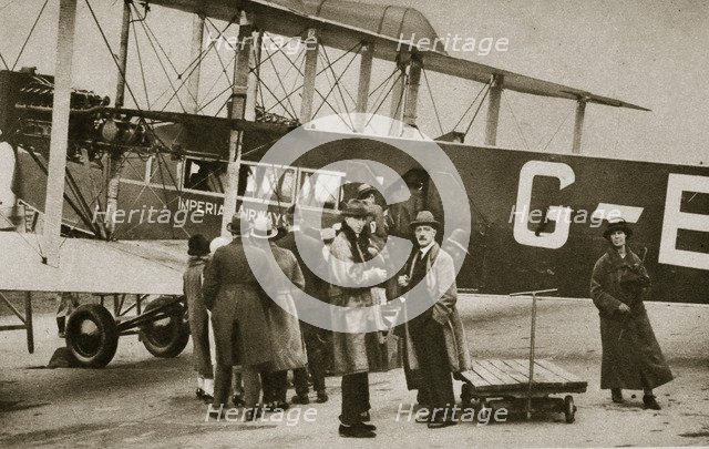 Passengers boarding an Imperial Airways aircraft for a flight to Paris, c1924-c1929 (?) Artist: Unknown