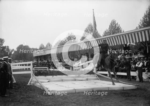 Horse Shows. Broad Jump, 1914. Creator: Harris & Ewing.