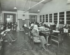 Men sitting in the library at Cedars Lodge old people's home, Wandsworth, London, 1939. Artist: Unknown.