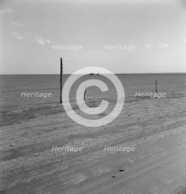Abandoned farm on the high plains, Texas County, Oklahoma, 1938. Creator: Dorothea Lange.