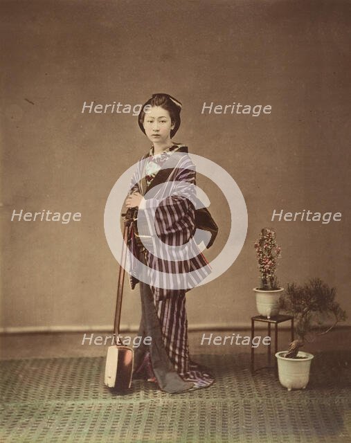[Japanese Woman in Traditional Dress Posing with Instrument], 1870s. Creator: Unknown.