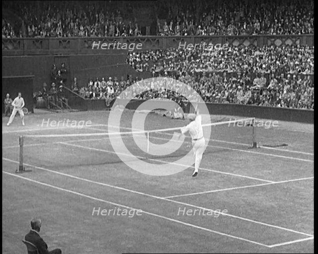 Two Male Civilians Playing a Match of Tennis at Centre Court at the All England Lawn Tennis..., 1920 Creator: British Pathe Ltd.