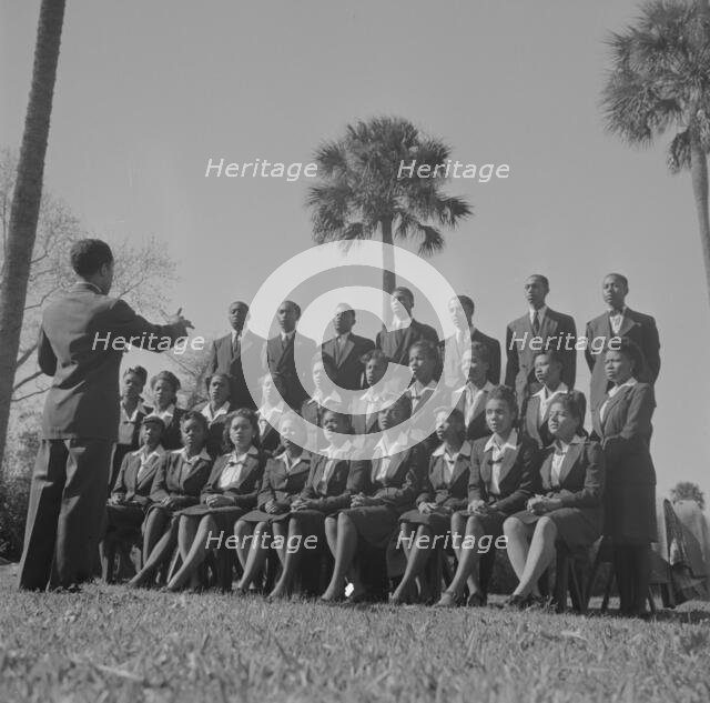 Bethune-Cookman College. Student choir singing on the campus, Daytona Beach, Florida, 1943. Creator: Gordon Parks.
