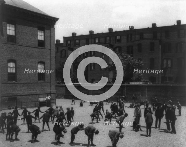 Recess period on the playground, 6th Division, (1899?). Creator: Frances Benjamin Johnston.