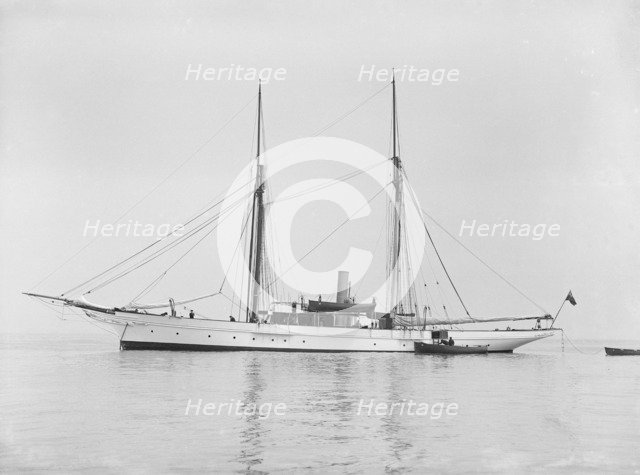 The steam yacht 'Priscilla' at anchor, 1911. Creator: Kirk & Sons of Cowes.