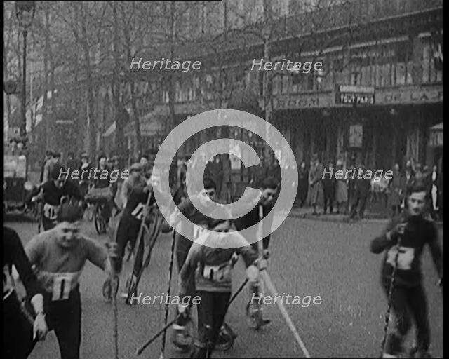 Racers Skiing Through Paris, France on Wheeled Skis, 1929. Creator: British Pathe Ltd.