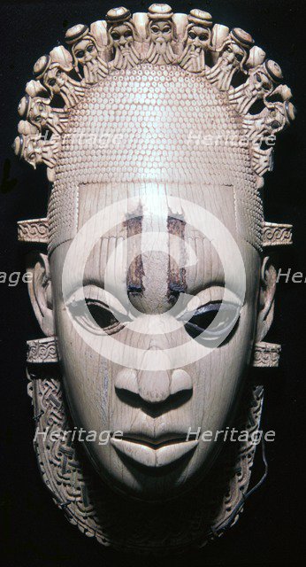 An ivory mask from Benin, Nigeria worn by the Oba of Benin on ceremonial occasions. Artist: Unknown