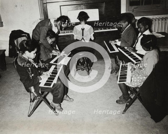 Children's piano class, Central Manhattan Music School, 1938. Creator: Solomon Horn.