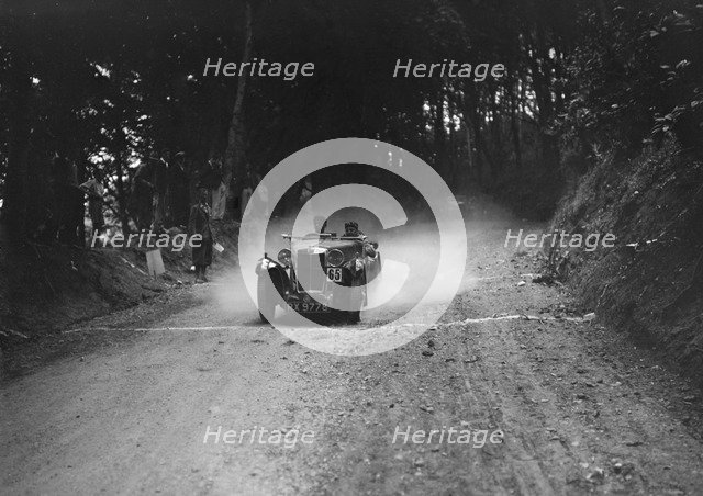 MG Magna taking part in a motoring trial, c1930s. Artist: Bill Brunell.
