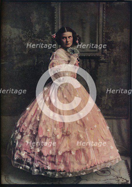 'A three-flounced ball-dress of pink silk, with overdress of white flowered gauze, 1850-60', c1913. Artist: Unknown.