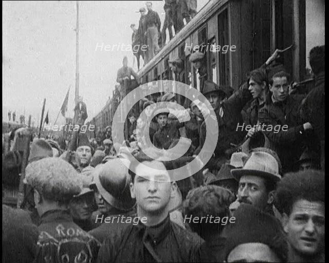 Italian Soldiers Standing on or Near a Train, 1922. Creator: British Pathe Ltd.