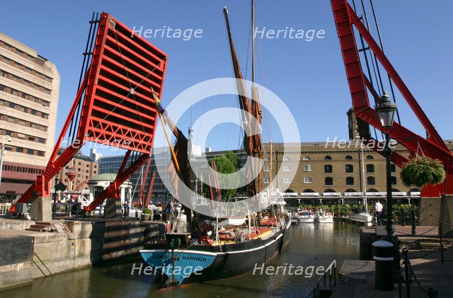 Barge passing through St Katherine's Lock, London