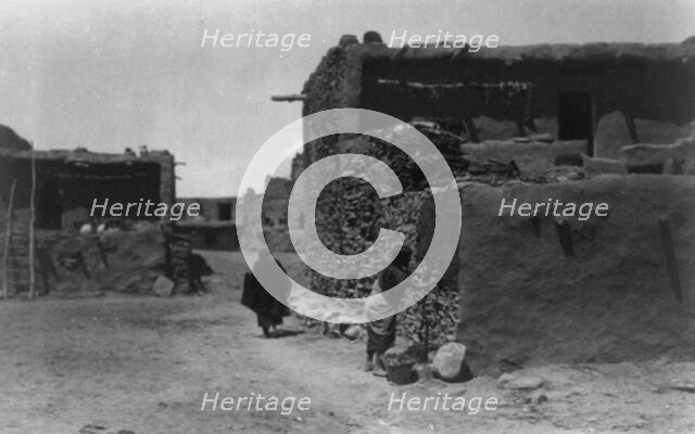 Hopi house builder, c1905. Creator: Edward Sheriff Curtis.