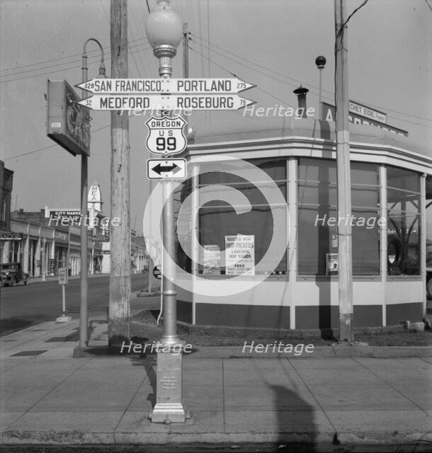 Sign of service station, U.S. 99, Josephine County, Oregon, 1939. Creator: Dorothea Lange.